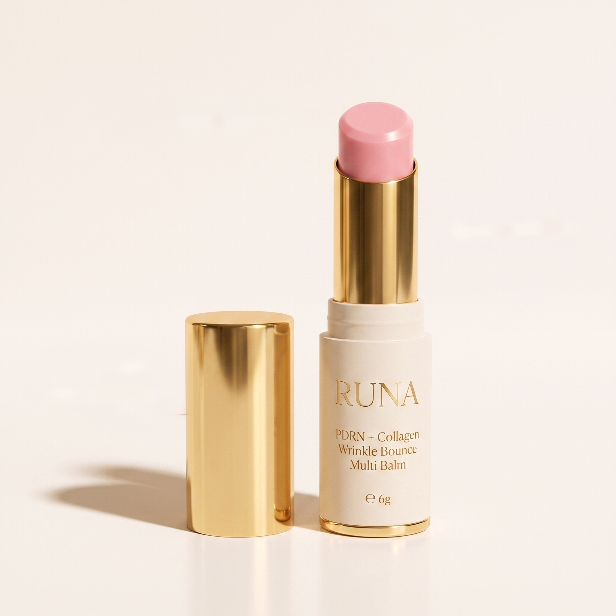 RUNA PDRN + Collagen Multi Balm — cream stick with gold cap
